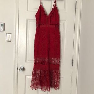Red embroidered dress.